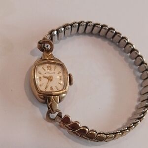 Women's Gold and Silver Watch
